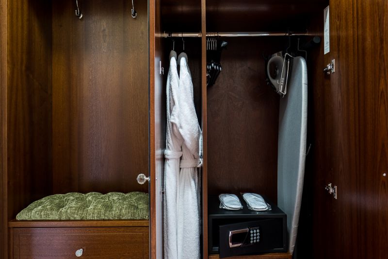 Wardrobe in deluxe rooms with bathroble safe ironing board www.clanardcourt.ie_v4