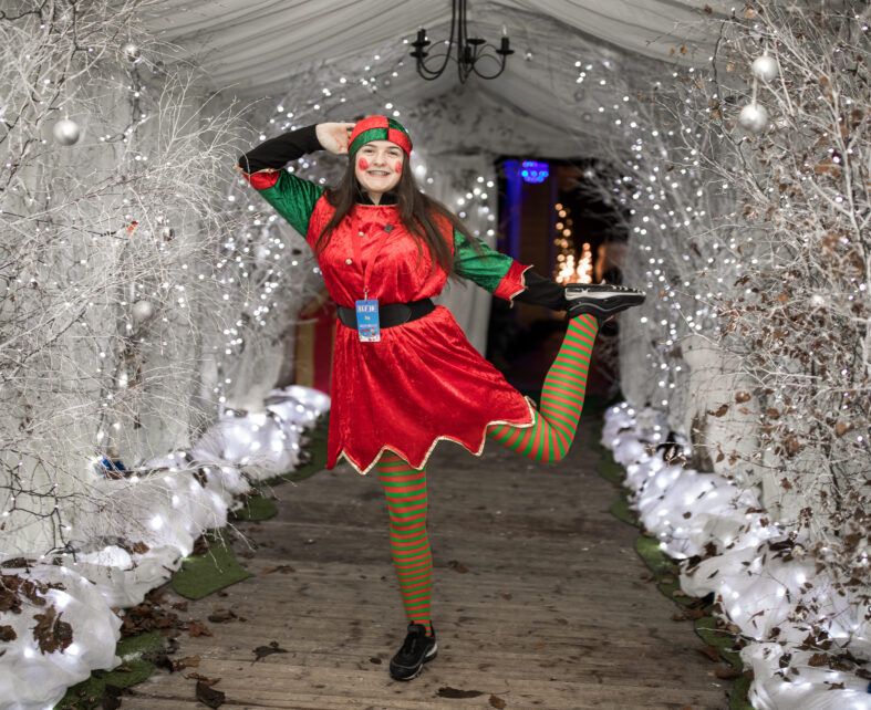 Elf jumping in Winter Wonderland corridor